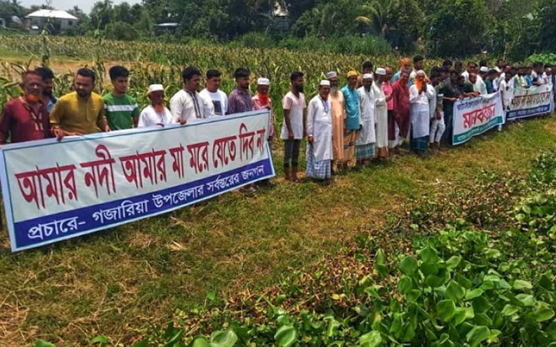 a human chain of villagers from six villages to protect the kajli river in munshiganj, bangladesh