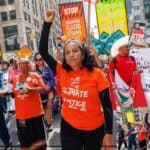seventy five thousand protesters take to the streets of new york to demand an end to the use of fossil fuels